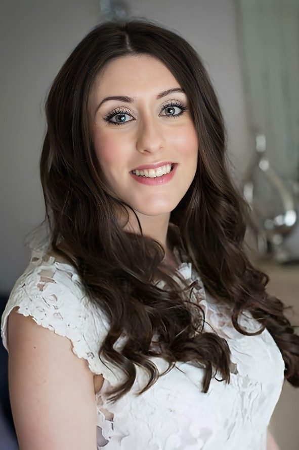 A happy, smiling bride on her wedding with natural make-up. One of my Chester Zoo brides on her wedding day.
