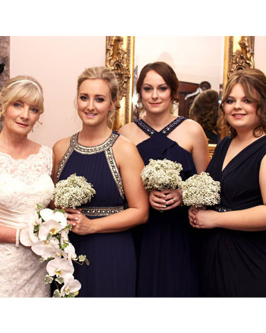 Bride getting ready with luxury wedding morning makeup service.