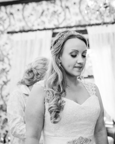 Bridal eye makeup on display as Llangollen bride looks down after professional makeup application
