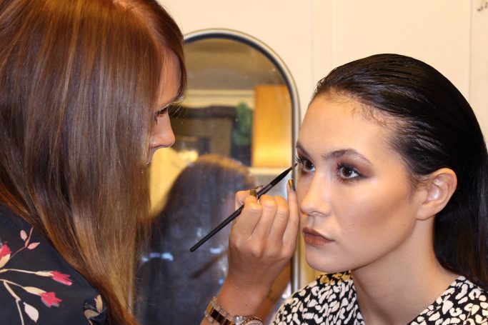 Kirsty applying makeup to editorial photoshoot model in Chester