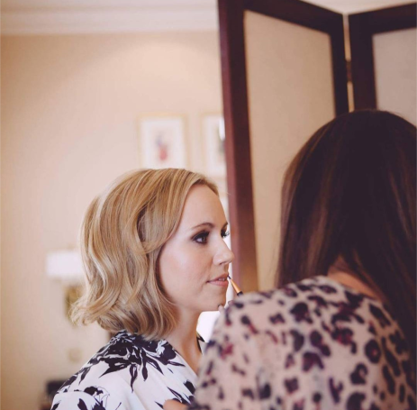 Kirsty applying bridal makeup in Chester, for a member of the bridal party